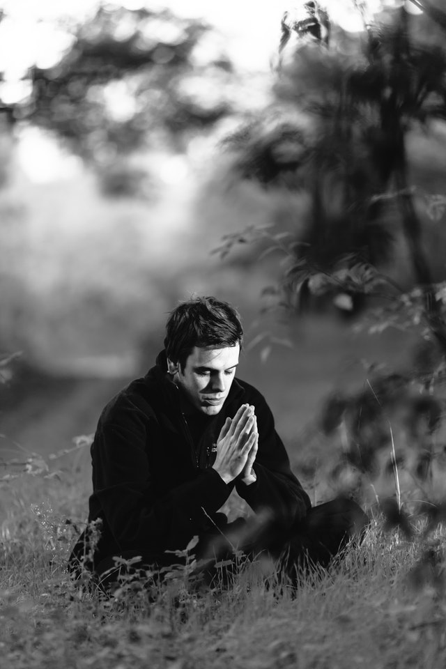 grayscale-photography-of-man-sitting-on-grass-field-156151 (1)